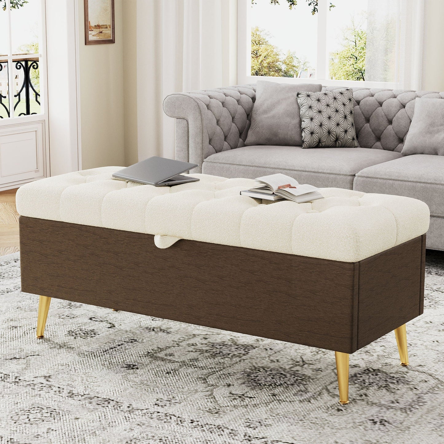 Modern tufted storage ottoman bench with gold metal legs and cream upholstery on Tampa Home & Garden Store