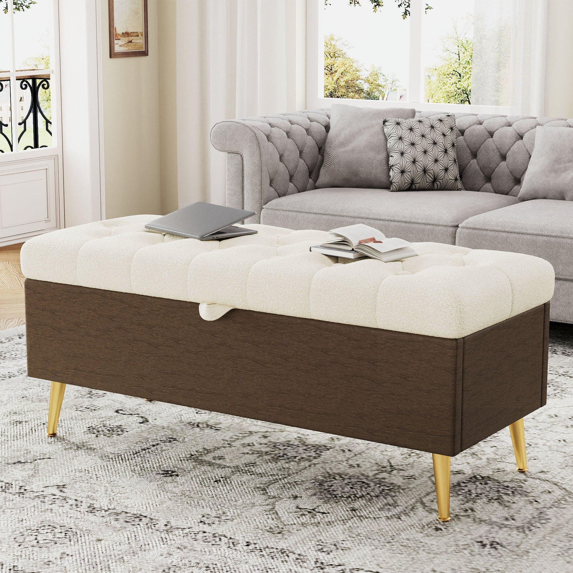 Modern tufted storage ottoman bench with gold metal legs and cream upholstery on Tampa Home & Garden Store