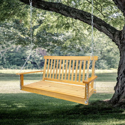 Wooden front porch swing with armrests hanging from metal chains in a sunny garden on Tampa Home & Garden Store