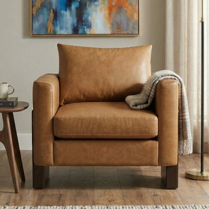 Modern Accent Chair by HouseOfZazla with tan leather upholstery and rubberwood legs on Tampa Home & Garden Store