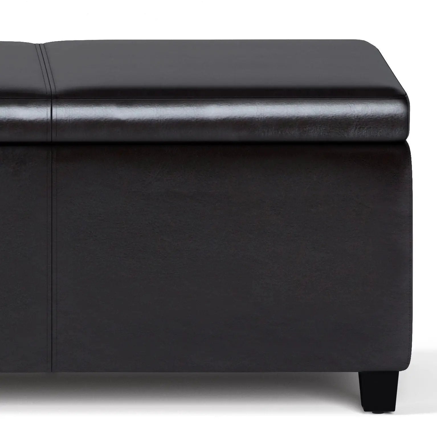 Avalon storage ottoman bench in black leather with stitched top and tapered leg on Tampa Home & Garden Store