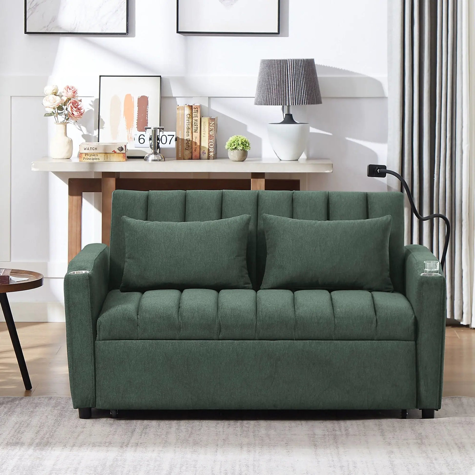 Green fabric convertible sofa bed loveseat with tufted cushions in living room on Tampa Home & Garden Store