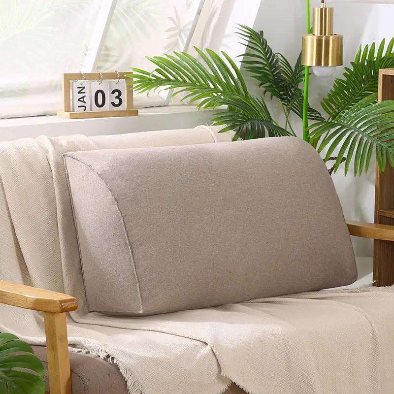 Removable washable sofa cushion in beige fabric on a cream sofa with tropical plants on Tampa Home & Garden Store
