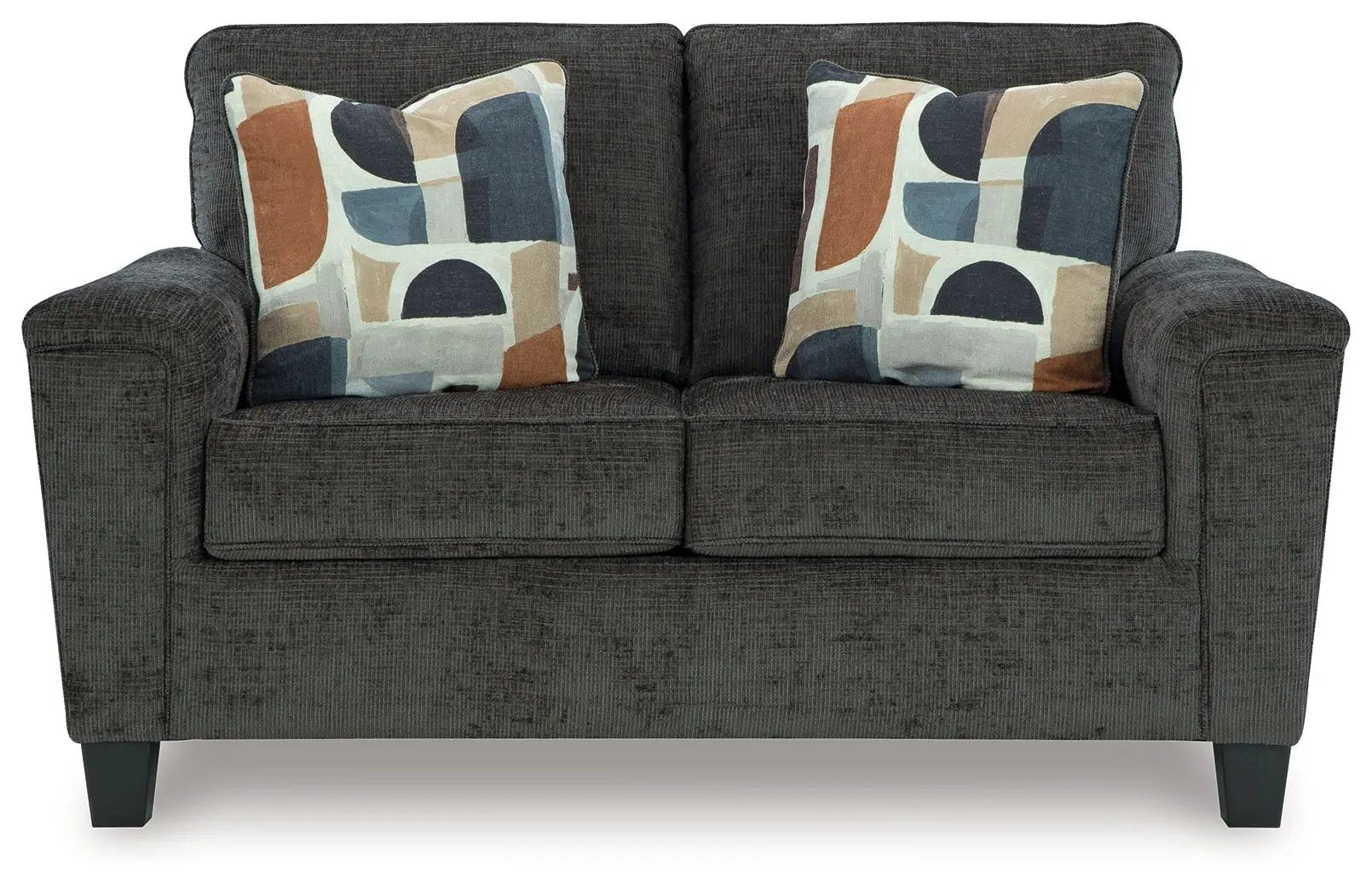 Erinslane Living Room Set stationary chair & ottoman in dark gray fabric with bold pillows on Tampa Home & Garden Store