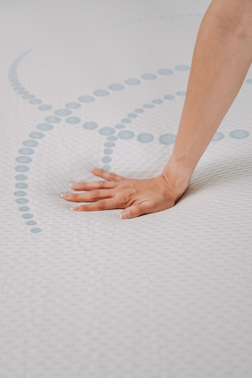 8-inch memory foam mattress by HouseOfZazla with blue dot pattern, hand pressing surface on Tampa Home & Garden Store
