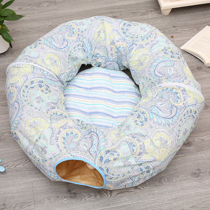 Cat tunnel sleeping nest donut bed in pastel paisley fabric with blue trim and striped cushion on Tampa Home & Garden Store