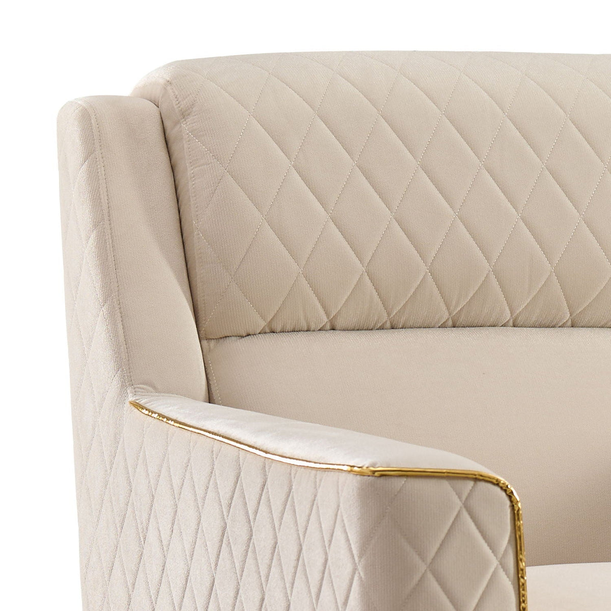 Beige quilted armchair with diamond stitching and gold-tone trim by HouseOfZazla on Tampa Home & Garden Store