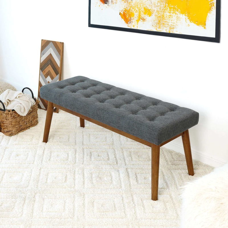 Modern gray velvet upholstered bench with tufted top and tapered wooden legs on Tampa Home & Garden Store
