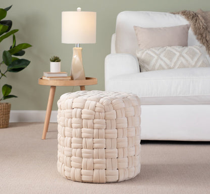 Braided round beige ottoman with chunky woven texture for versatile seating in the living room on Tampa Home & Garden Store
