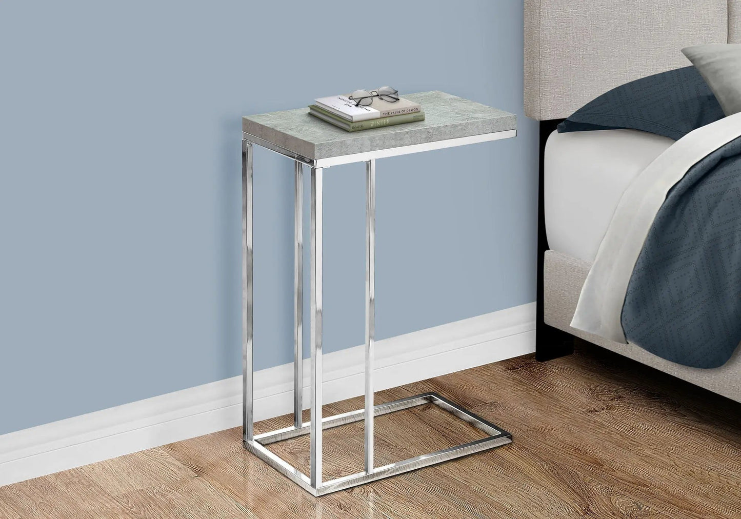 C-shaped accent table with tempered glass top, chrome metal frame, modern contemporary design on Tampa Home & Garden Store