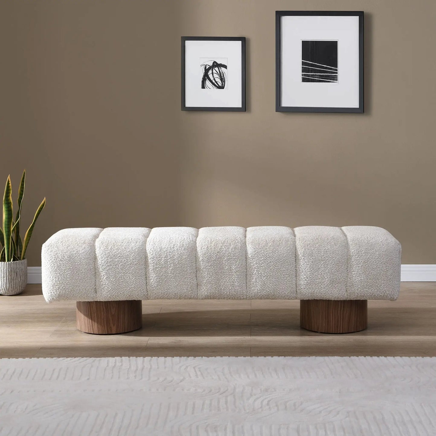 Upholstered dining bench in white boucle fabric with rounded wooden legs for dining room on Tampa Home & Garden Store