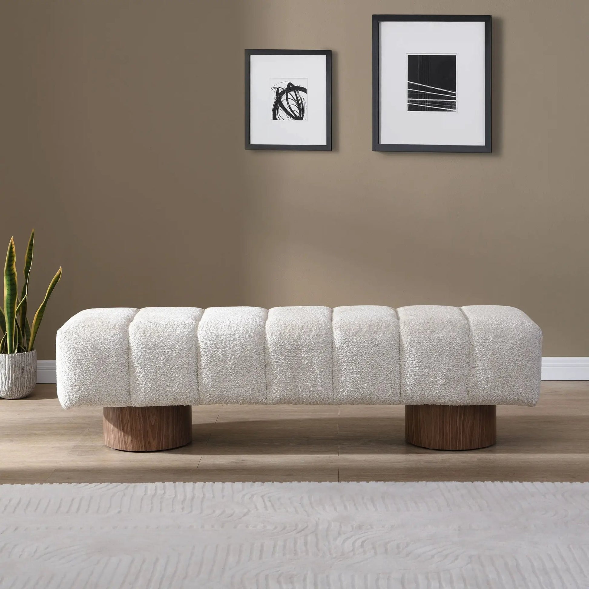 Upholstered dining bench in white boucle fabric with rounded wooden legs for dining room on Tampa Home & Garden Store