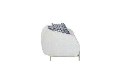 Rounded white fabric stationary sofa with blue cushions and brass legs on Tampa Home & Garden Store
