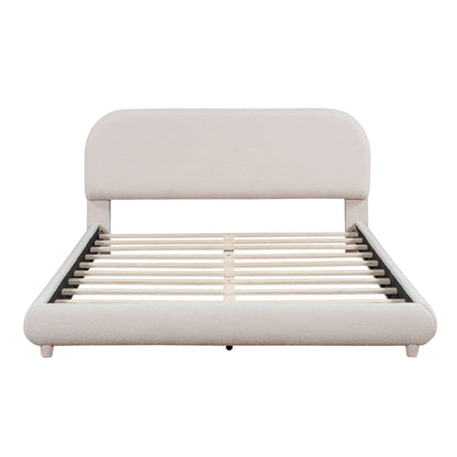 Upholstered platform bed with thick curved beige headboard and slatted frame on Tampa Home & Garden Store