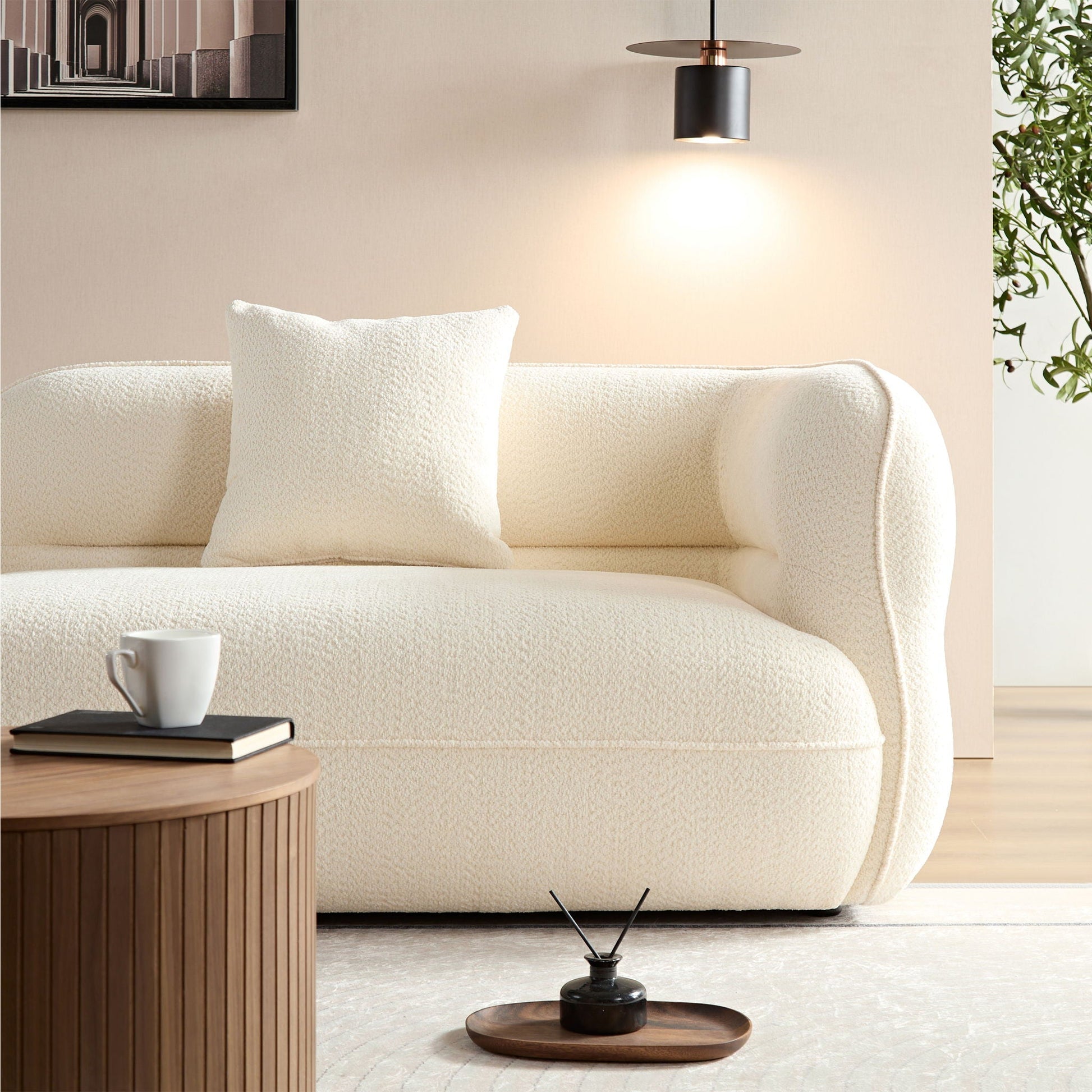 Sectional sofa in cream boucle with solid wood frame and high-density cushions, 2 pillows on Tampa Home & Garden Store