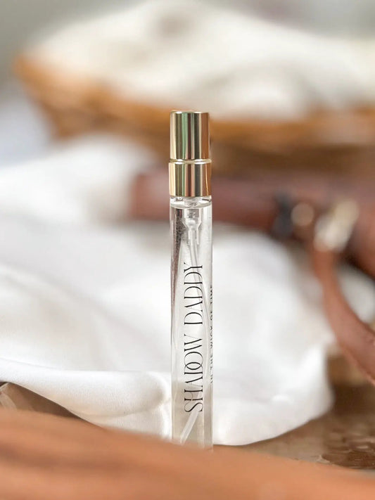 Shadow Daddy Travel Perfume vial with gold-tone cap and clear glass body on Tampa Home & Garden Store
