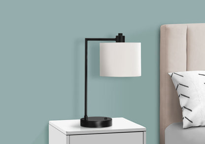 Table lamp with USB port, modern black metal frame and cream fabric shade on Tampa Home & Garden Store