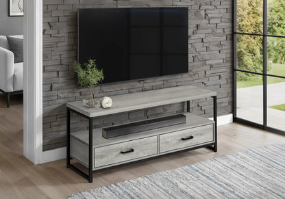 TV stand console in gray-washed wood with black metal frame and storage drawers on Tampa Home & Garden Store