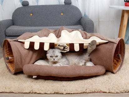 Cat tunnel brown collapsible indoor play toy with striped interior, cat resting inside on Tampa Home & Garden Store