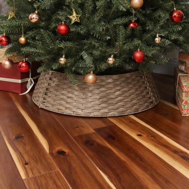 2.25 ft Rustic Christmas Tree Skirt woven wicker brown around tree base on hardwood floor on Tampa Home & Garden Store