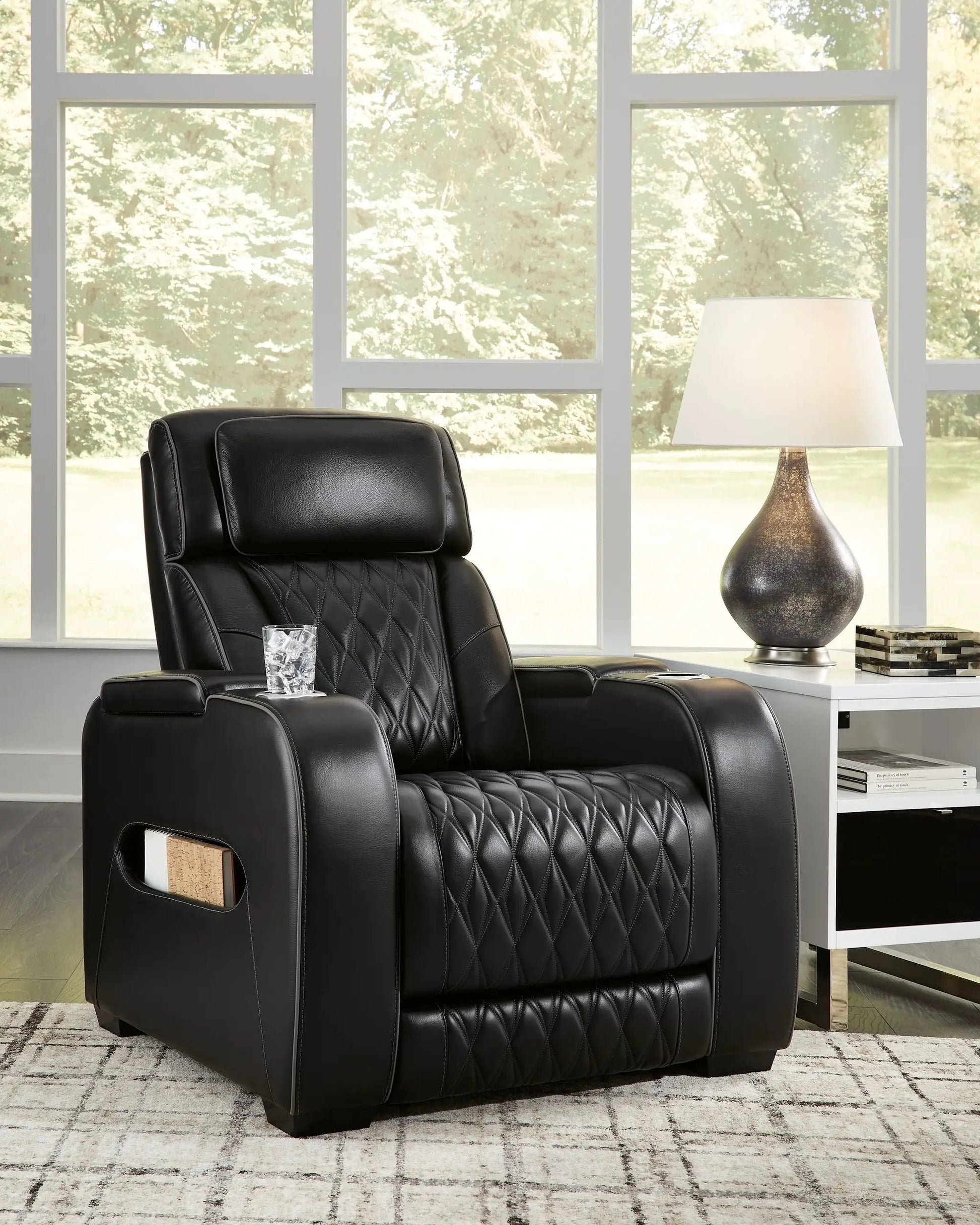 Boyington power recliner adjustable headrest black leather quilted upholstery Unique Piece on Tampa Home & Garden Store