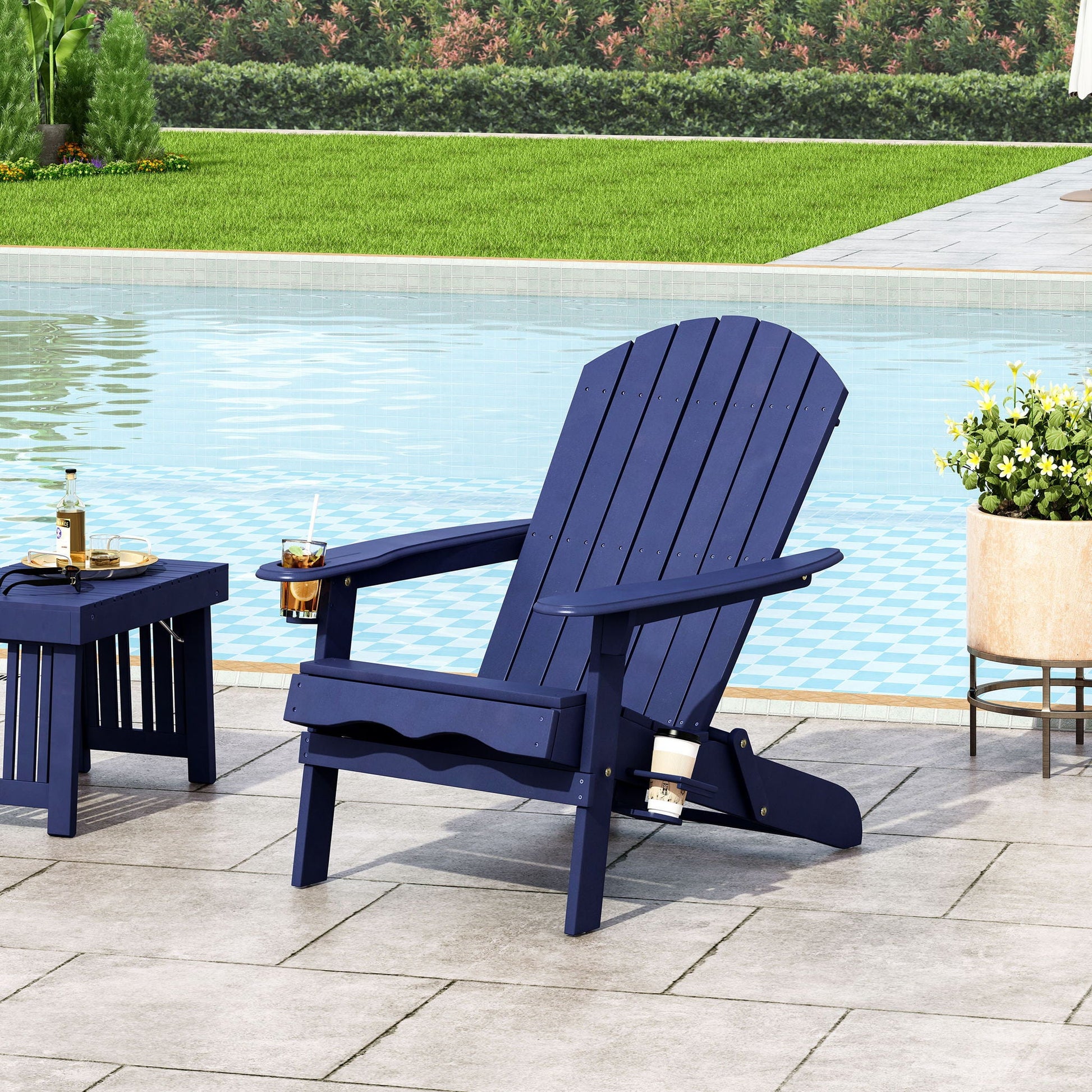 Zenithia Outdoor Foldable Adirondack Chair with 2 Cup Holders navy blue by poolside patio on Tampa Home & Garden Store