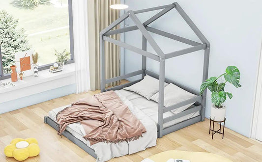 Wood full-size house bed with grey guardrails and roof-frame canopy in a bright bedroom on Tampa Home & Garden Store