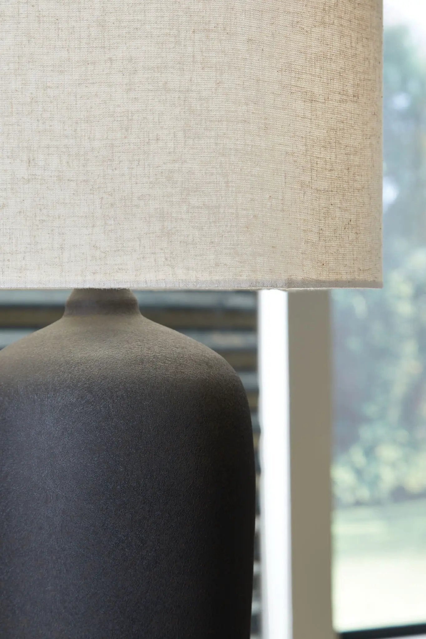 Ryenburg metal table lamp black with beige linen shade on Tampa Home & Garden Store