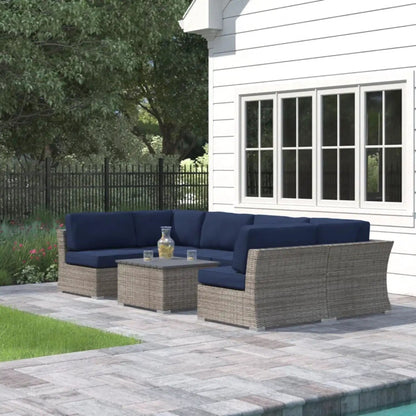 Wicker outdoor sectional with navy cushions and matching coffee table, 2-piece set on Tampa Home & Garden Store
