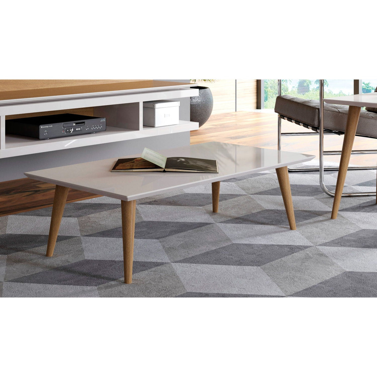 Off white lacquered coffee table with solid wood tapered legs in a contemporary living room on Tampa Home & Garden Store