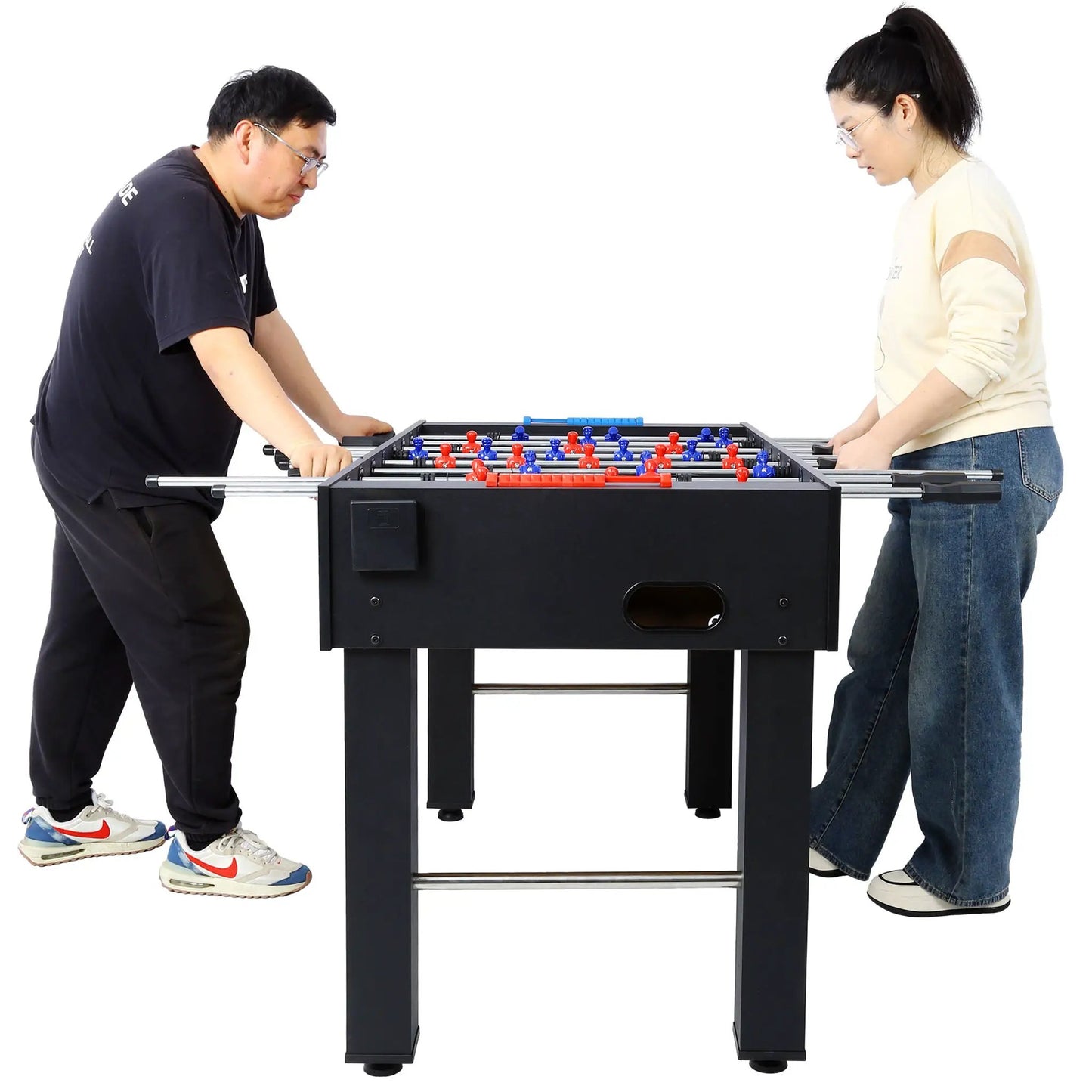 Hurricane foosball table; two players on a black table with red and blue figurines on Tampa Home & Garden Store