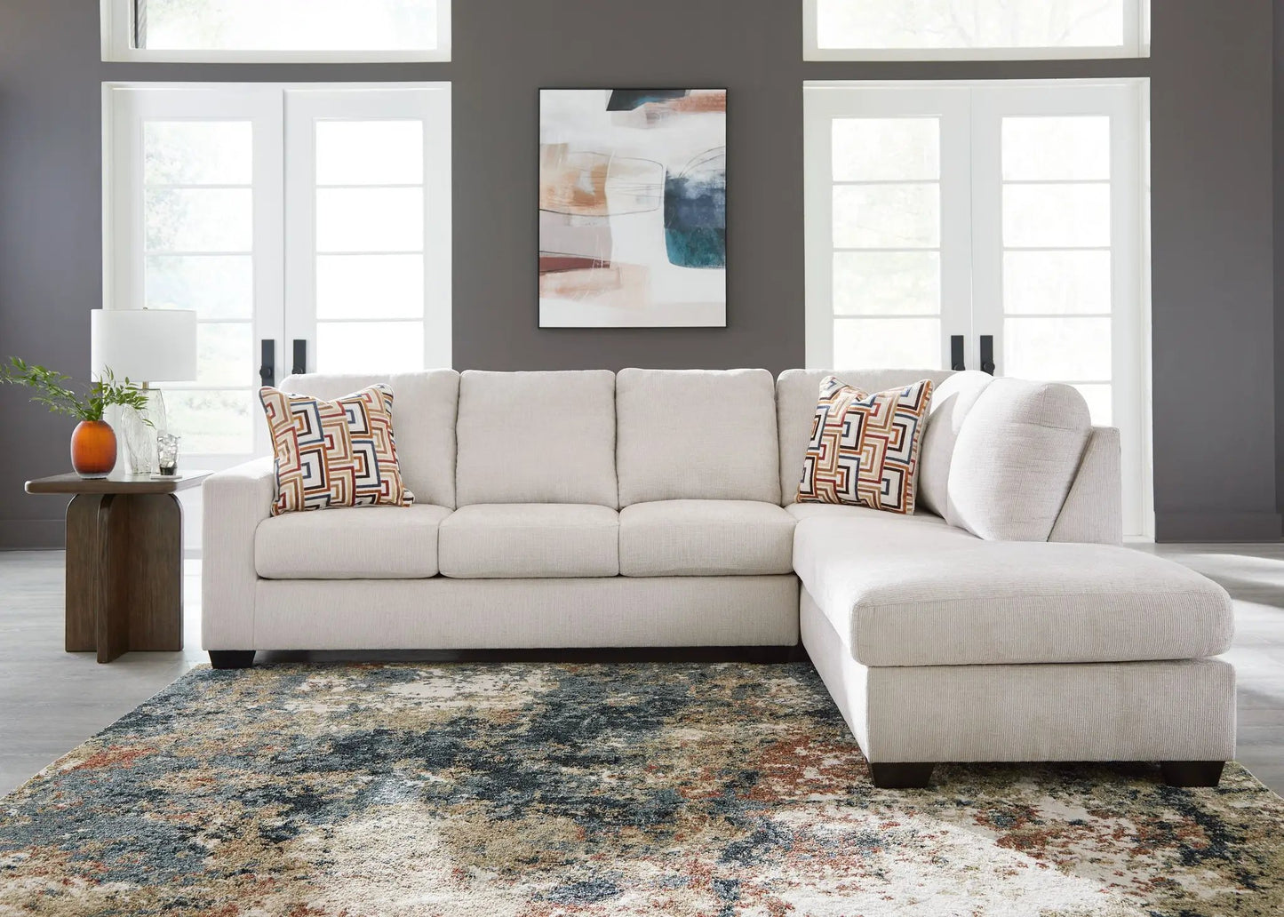 Aviemore Sectional sofa in beige fabric with geometric pillows by Unique Piece Furniture on Tampa Home & Garden Store