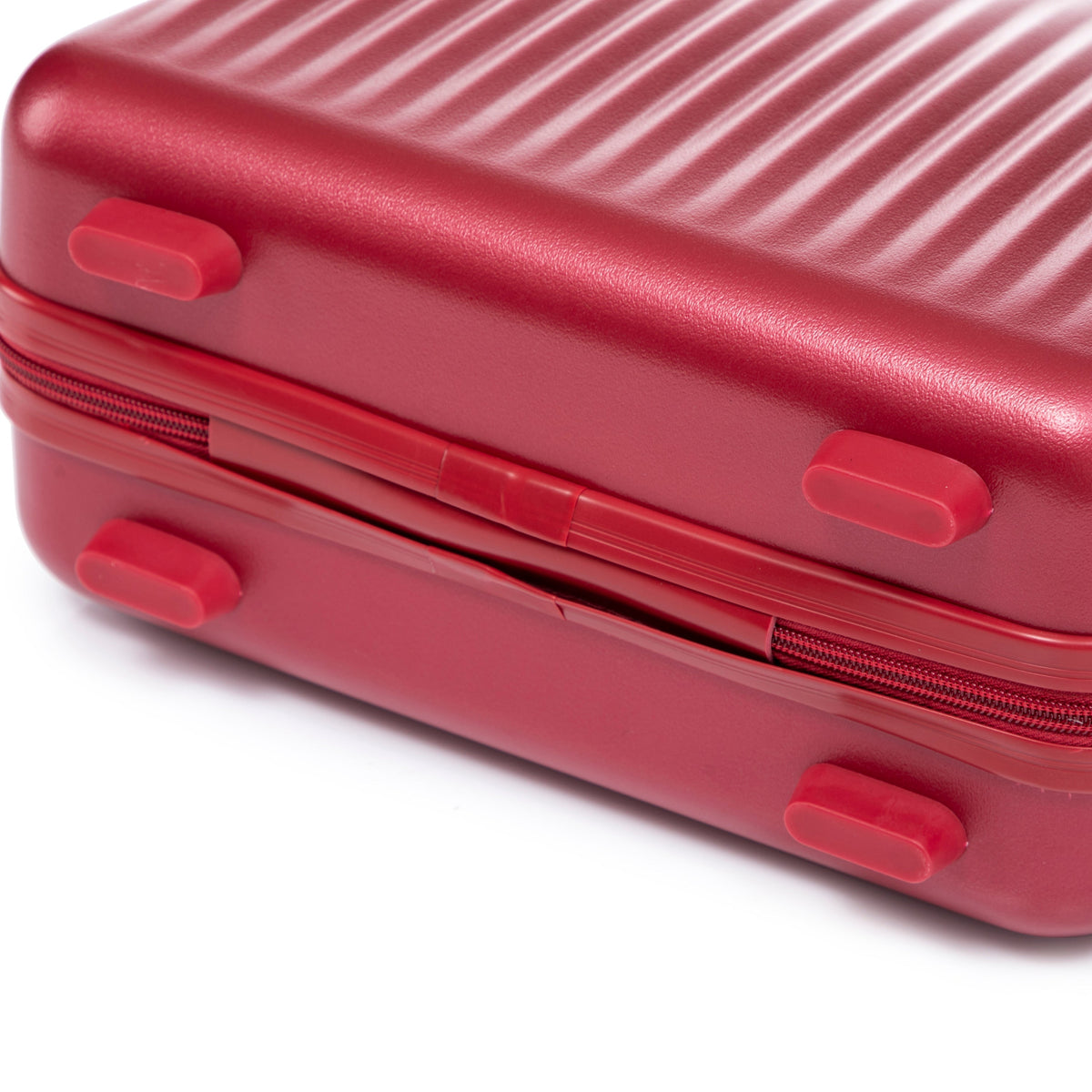 Luggage set red ABS hard-shell close-up with zipper seams and bumpers on Tampa Home & Garden Store