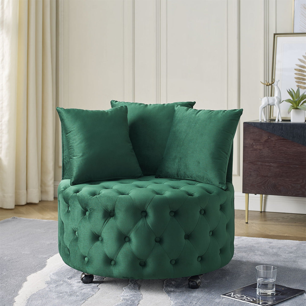 Modern upholstered swivel chair in green velvet with tufted design on casters on Tampa Home & Garden Store