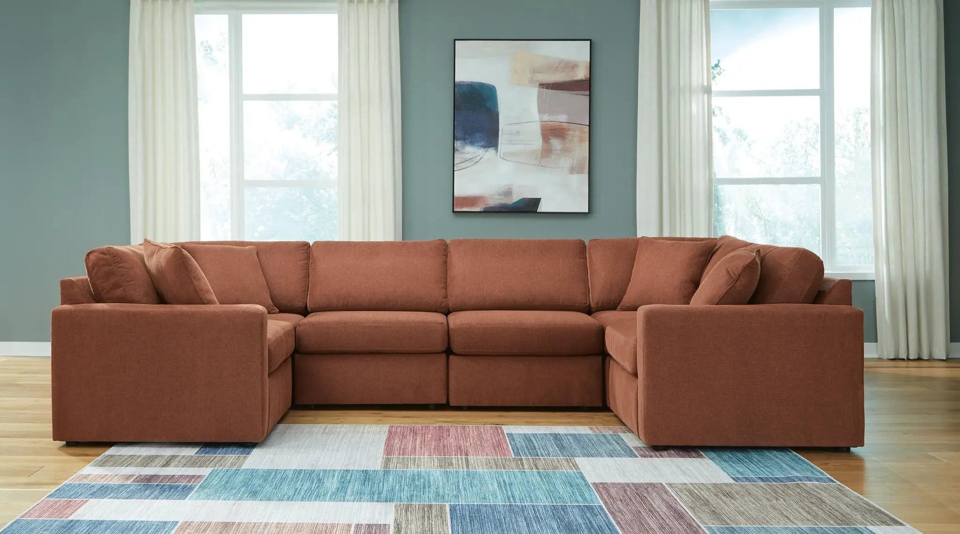 Modmax Spice sectional by Unique Piece Furniture, rust-orange stationary sofa in living space on Tampa Home & Garden Store