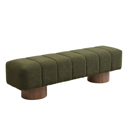 Upholstered dining bench in olive boucle with chunky padded sections and wood legs on Tampa Home & Garden Store