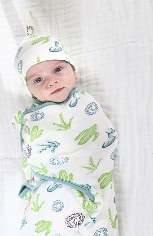 Stevvex baby swaddle blanket with cap, white wrap featuring blue-green cactus prints on Tampa Home & Garden Store