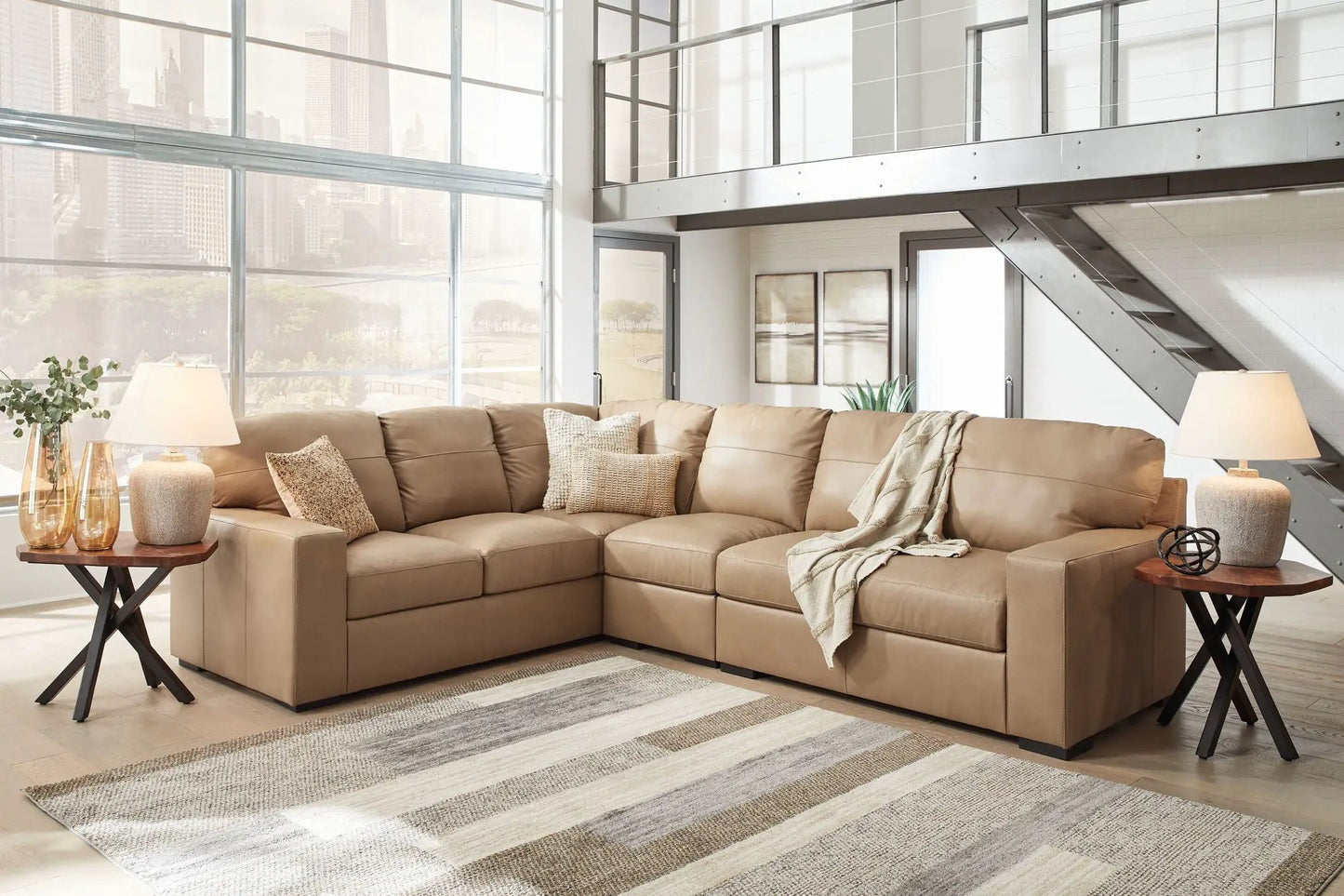 Bandon Sectional, tan leather-look stationary sofa by Unique Piece Furniture in a modern loft on Tampa Home & Garden Store