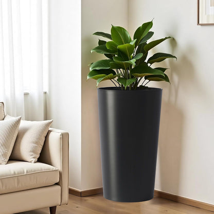 Planter For Outdoor tall dark gray cylindrical planter with lush green leafy plant on Tampa Home & Garden Store