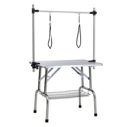 Folding pet grooming table with stainless steel frame rubber mat adjustable arms and clamps on Tampa Home & Garden Store