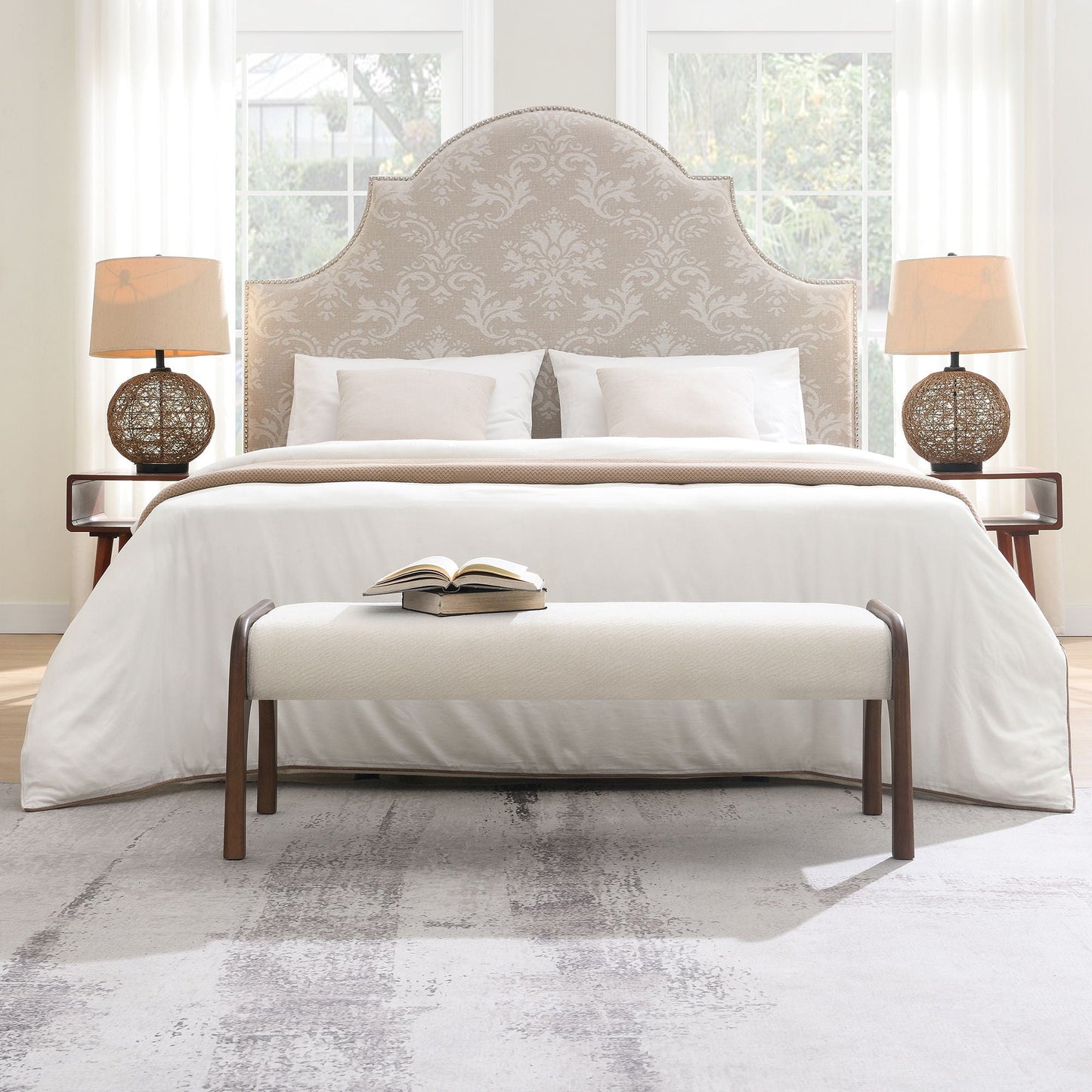 Modern upholstered long bench with beige fabric seat and wood legs at bed foot on Tampa Home & Garden Store