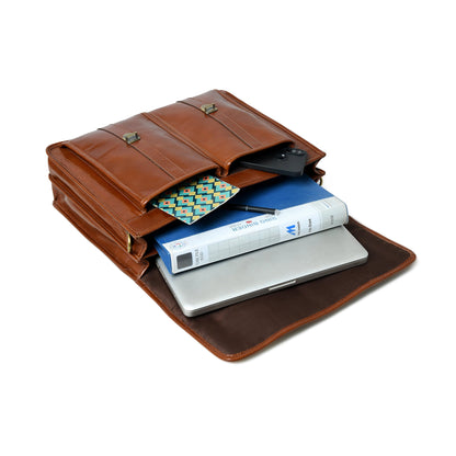 The Architect Brown leather briefcase with gold clasps opens to reveal laptop and binder on Tampa Home & Garden Store