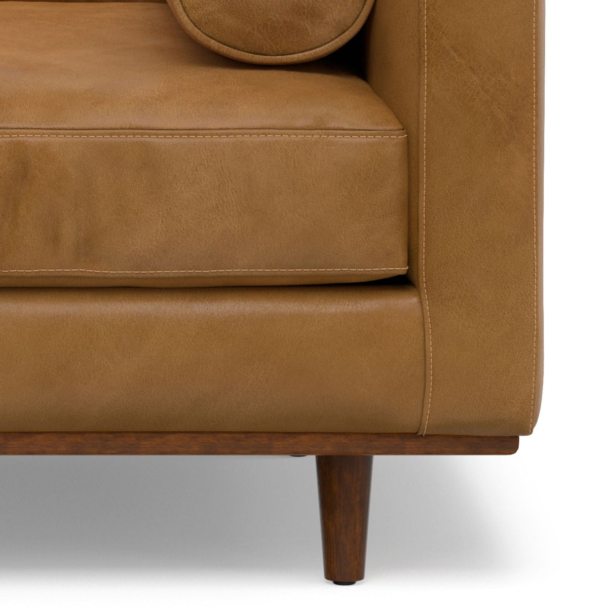 Wide Arm Chair with removable cushions in tan leather, visible contrast stitching, wood leg on Tampa Home & Garden Store