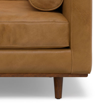 Wide Arm Chair with removable cushions in tan leather, visible contrast stitching, wood leg on Tampa Home & Garden Store