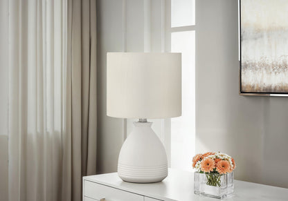 Cream modern table lamp by HouseOfZazla with fabric shade on white dresser on Tampa Home & Garden Store