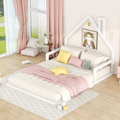 Two white wooden platform beds with house-shaped headboards, beige bedding and pink accents on Tampa Home & Garden Store