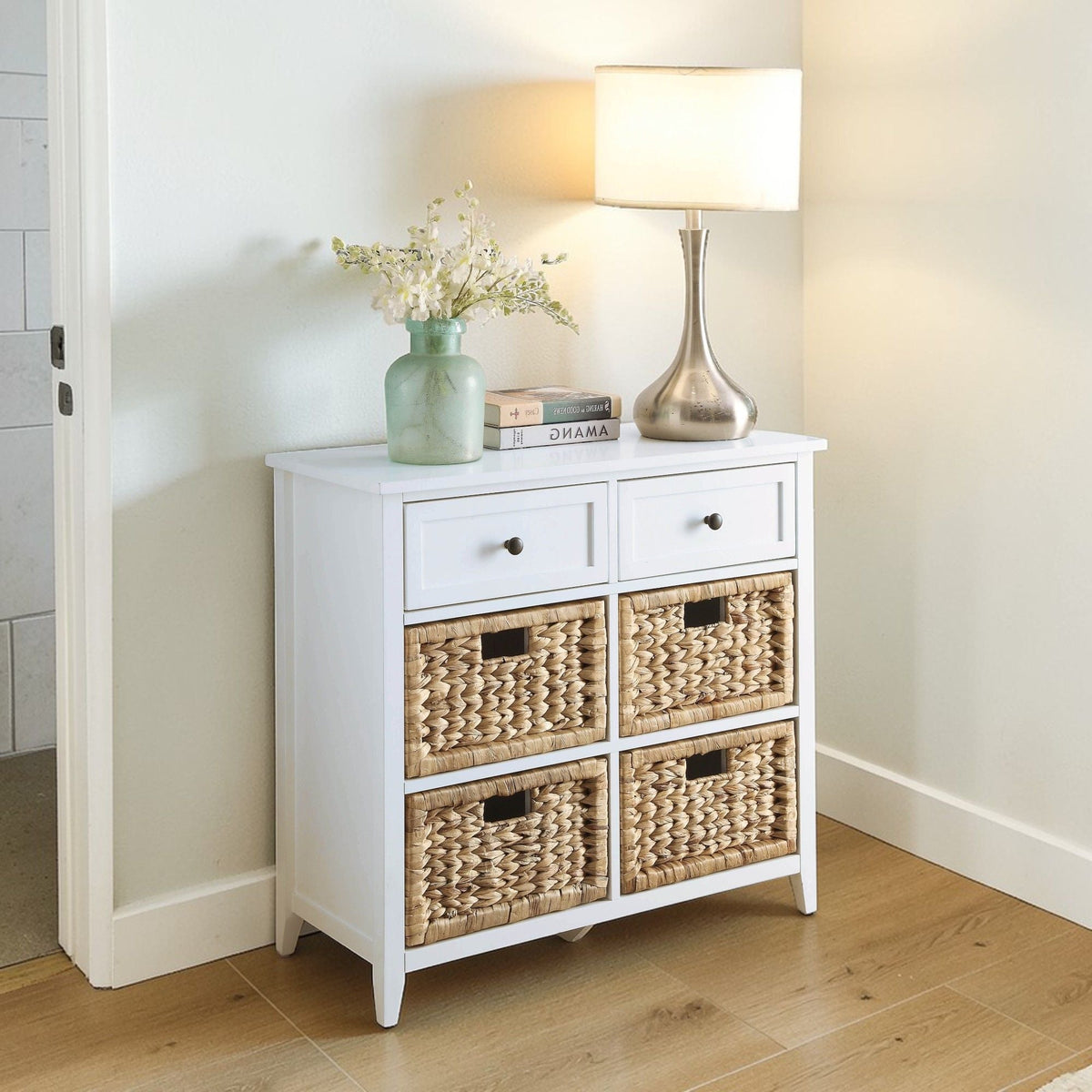 Console cabinet with six woven basket drawers in white finish, topped with a vase and lamp on Tampa Home & Garden Store