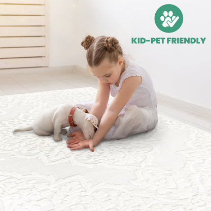 Cream medallion area rug with high-low pile, 6 ft 7 in x 9 ft, with child and puppy on Tampa Home & Garden Store