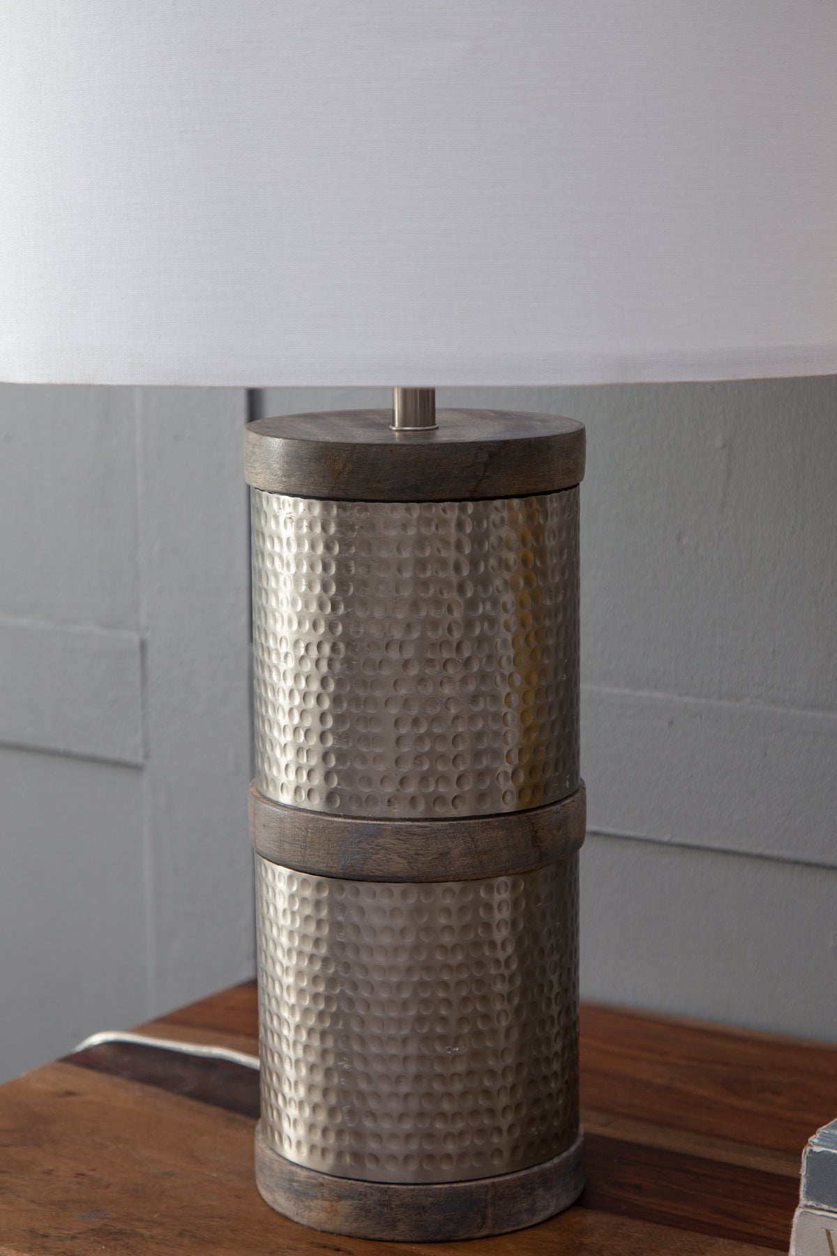 D16x24.4 inch hammered iron table lamp with mango wood rings and a white shade on Tampa Home & Garden Store