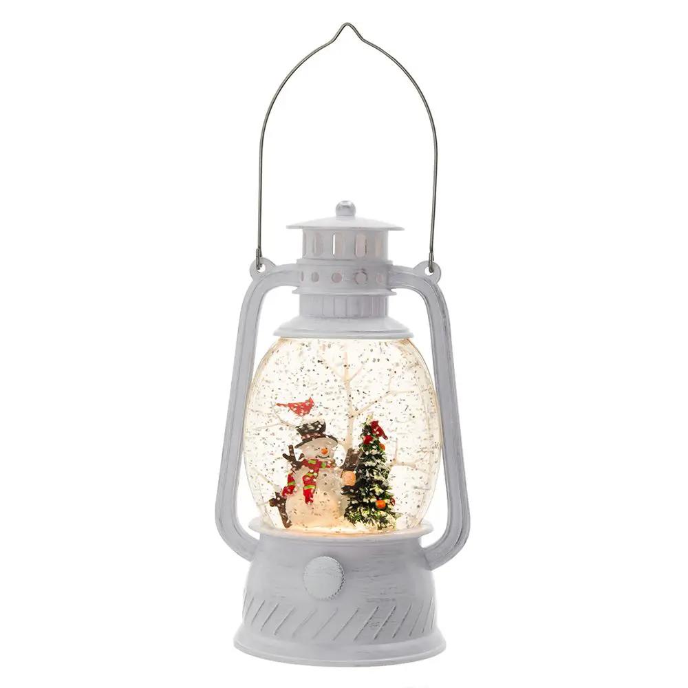 White plastic Christmas lantern with snowman and tree; LED water-spinning 6-hour timer on Tampa Home & Garden Store